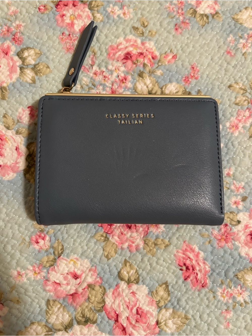 Navy Zip Wallet- a few marks as shown. Zipper is a little tough to zip
